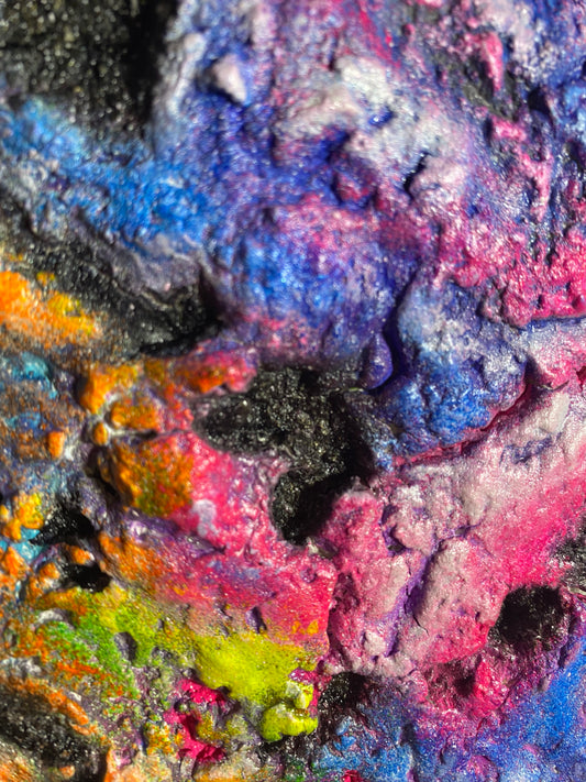 close up Melting Galaxy neon painting by Melted Glam – vibrant textured 3D artwork in neon pink, orange, green, and blue with cosmic galaxy patterns.