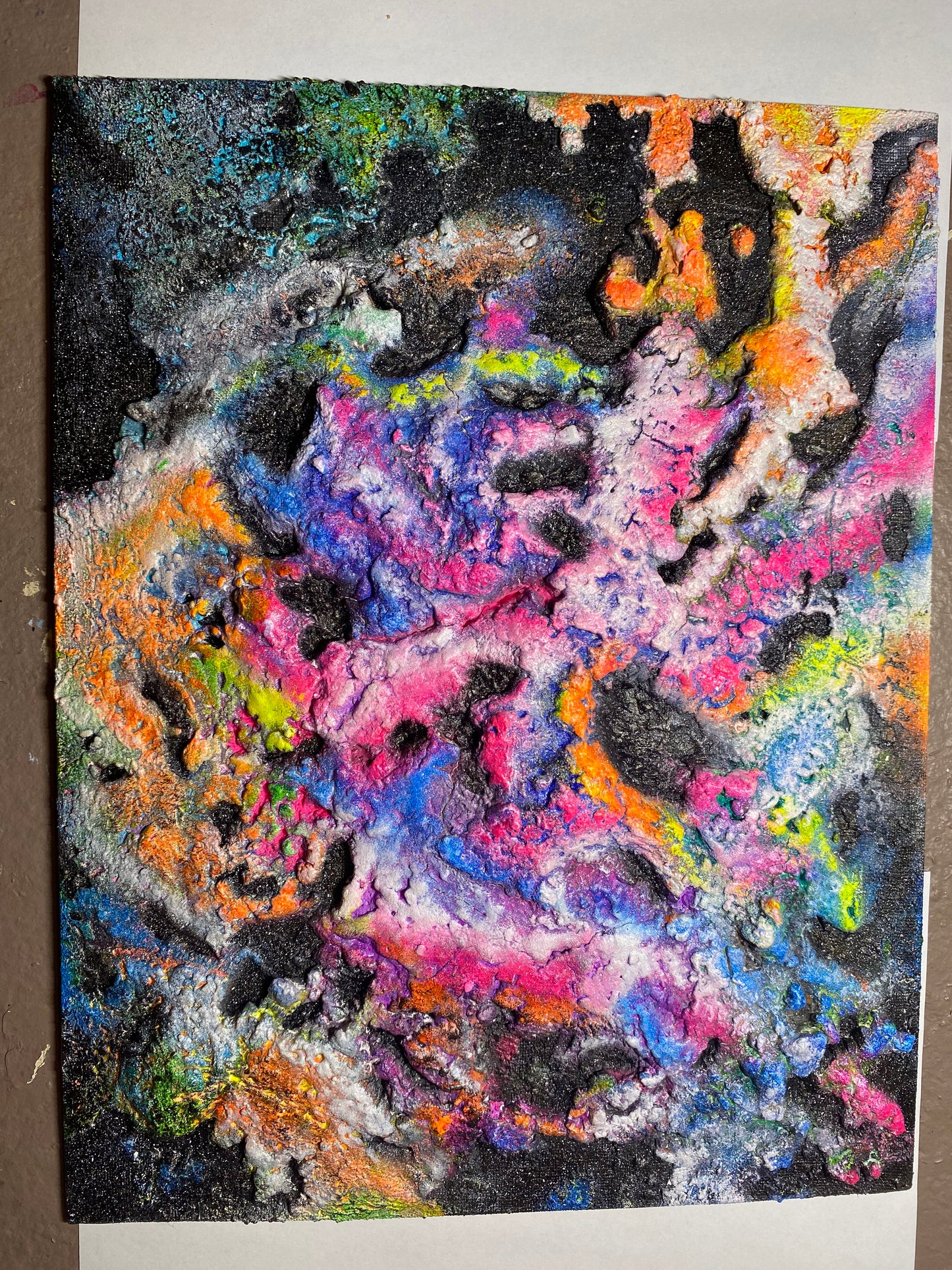 Melting Galaxy neon painting by Melted Glam – vibrant textured 3D artwork in neon pink, orange, green, and blue with cosmic galaxy patterns