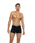Man wearing black swim briefs with a brand logo on a white background, play boy