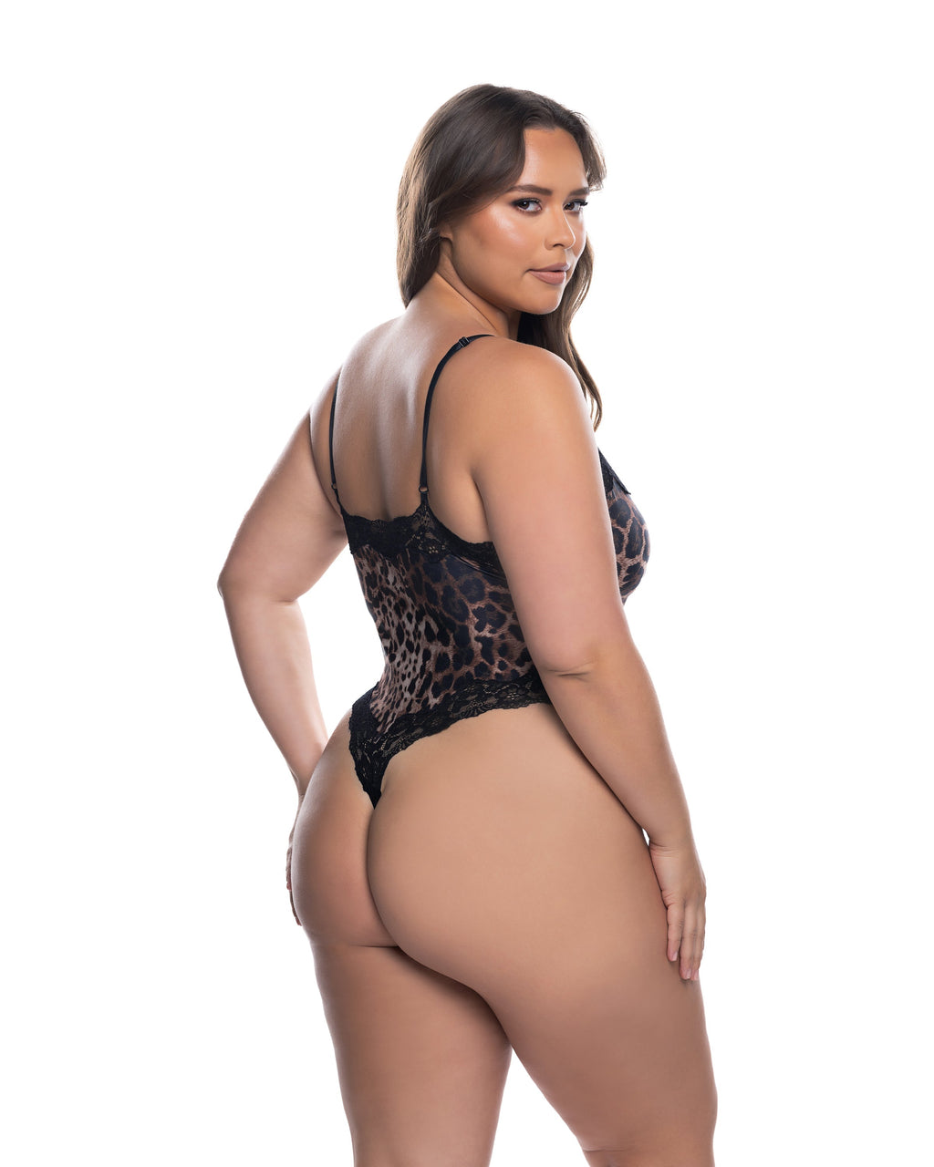 Woman wearing a leopard print lingerie set on a white background, plus size back